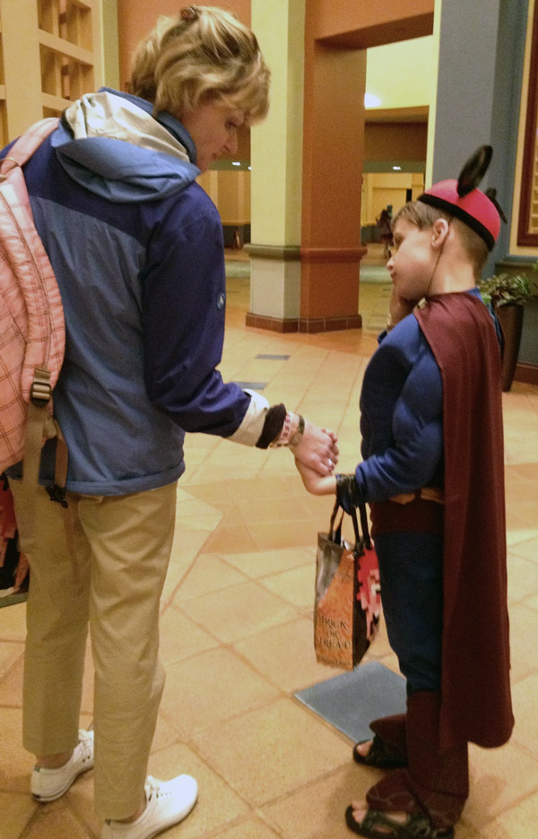 Harry trick-or-treating with his mother