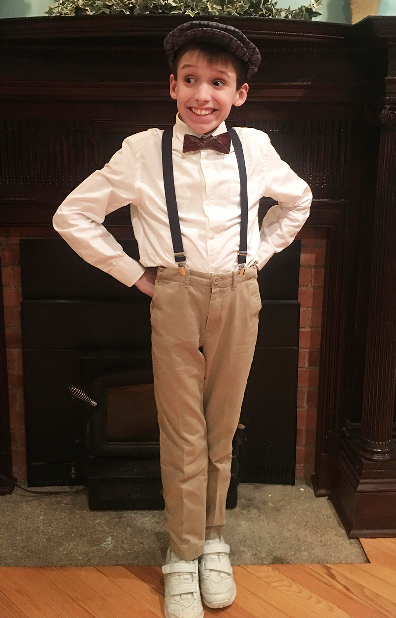 Harry dressed up and smiling